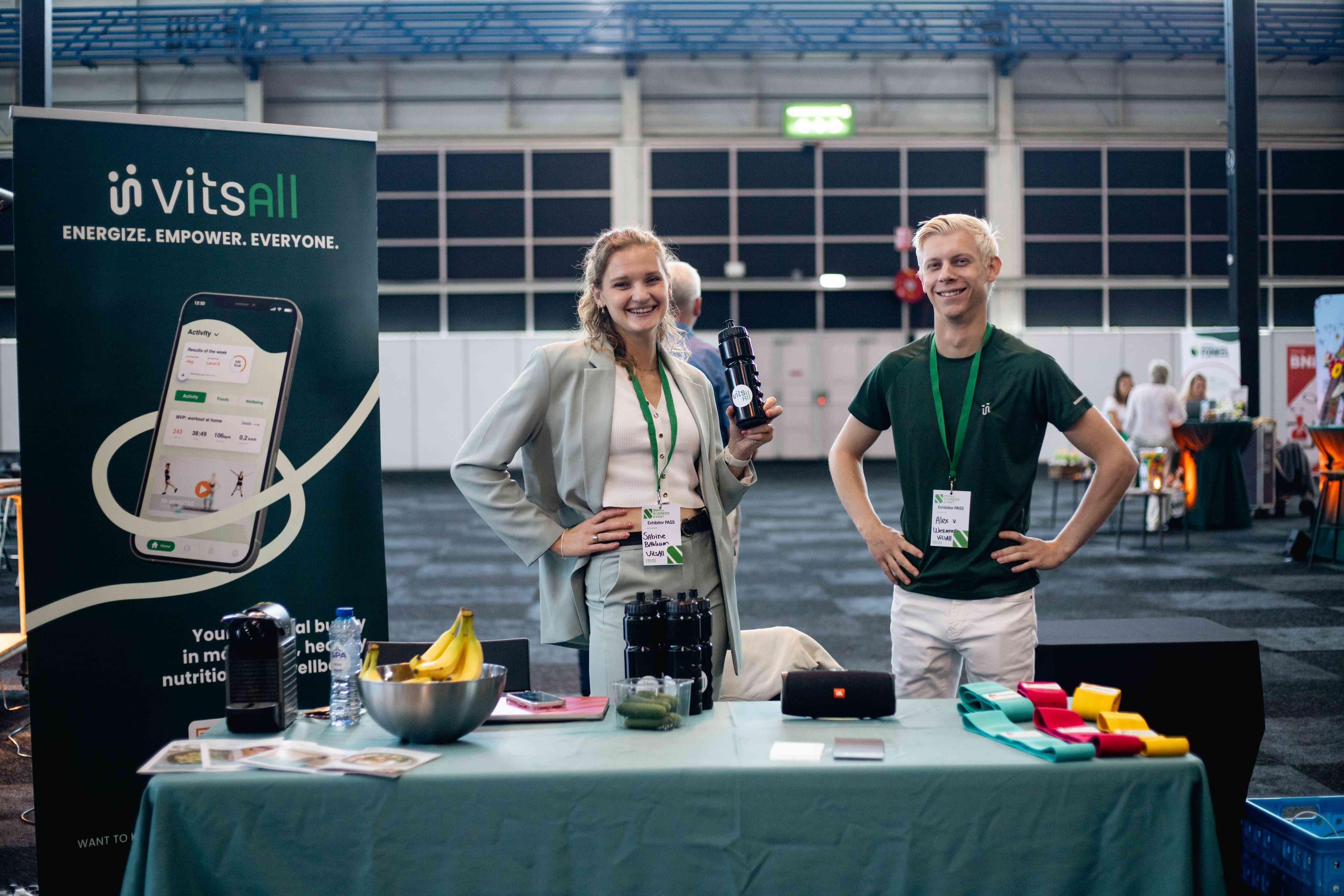 Het VitsAll-team bij hun stand op een business event